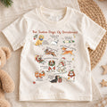 The Twelve Dogs Of Christmas Shirt, Cute Holiday Puppies Kids T-Shirt, Dog Lover Toddler Tee, Illustrated Christmas Dogs Graphic Top, Gift — product view 1