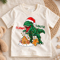 Funny Claws Santa T-Rex Christmas Shirt, Dinosaur Holiday Kids Tee, Cute Festive Winter Outfit, Funny Christmas Gift for Little Boys — product view 1