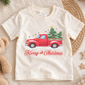 Merry Christmas Red Truck Kids Shirt, Snowy Christmas Tree Pickup Tee, Vintage Holiday Outfit for Boys Girls, Cute Christmas Gift for Kids — product view 1