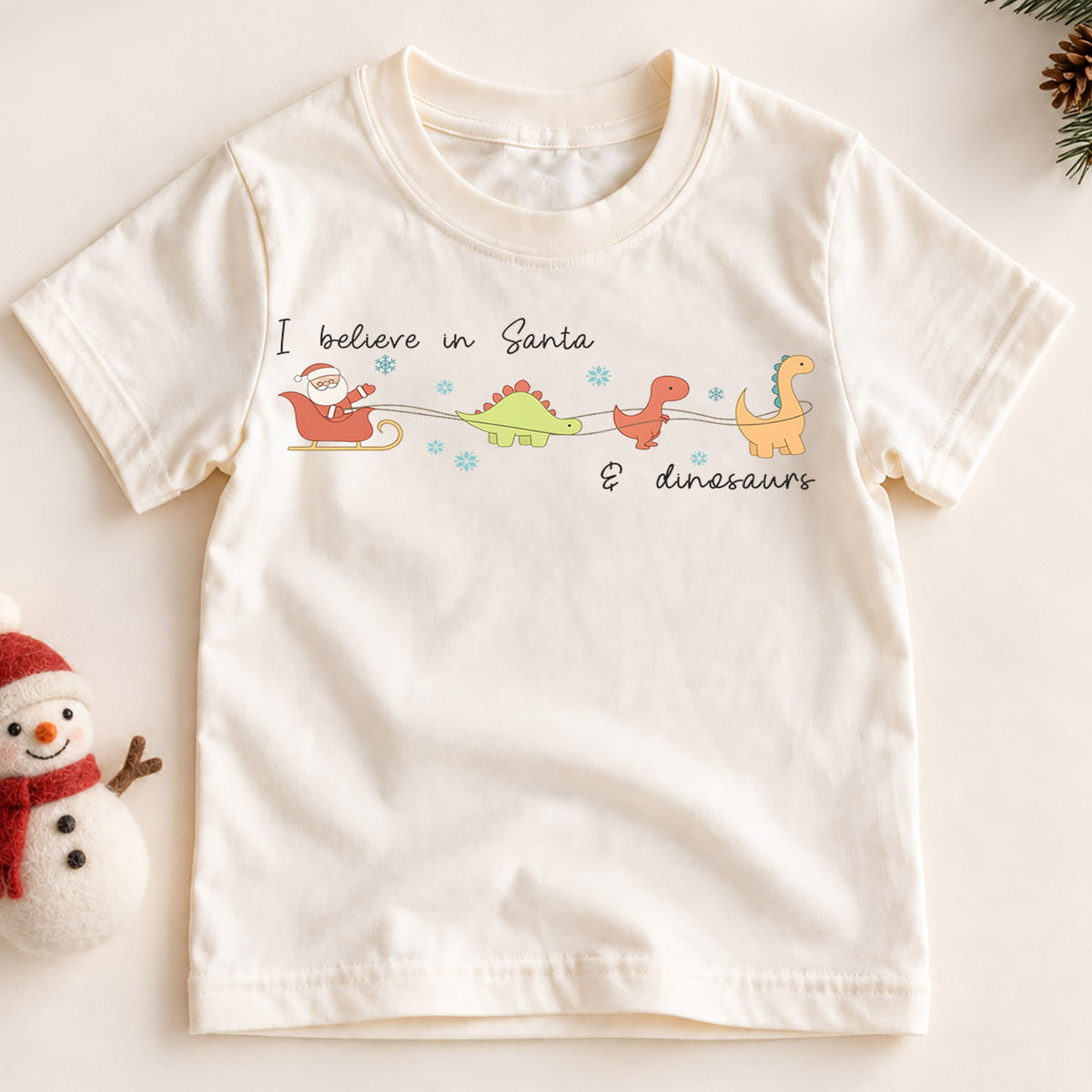 I Believe in Santa and Dinosaurs Kids Shirt, Funny Dinosaur Christmas Tee, Cute Minimal Holiday T Shirt for Kids — product view 2