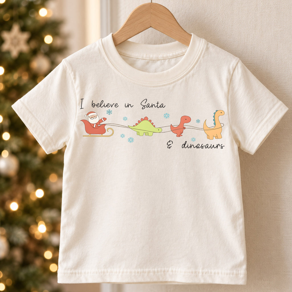 I Believe in Santa and Dinosaurs Kids Shirt, Funny Dinosaur Christmas Tee, Cute Minimal Holiday T Shirt for Kids — product view 5