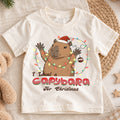 I Want a Capybara for Christmas Kids Shirt, Funny Capybara Holiday Tee, Cute Animal Christmas Shirt, Adorable Festive Gift for Kids — product view 1