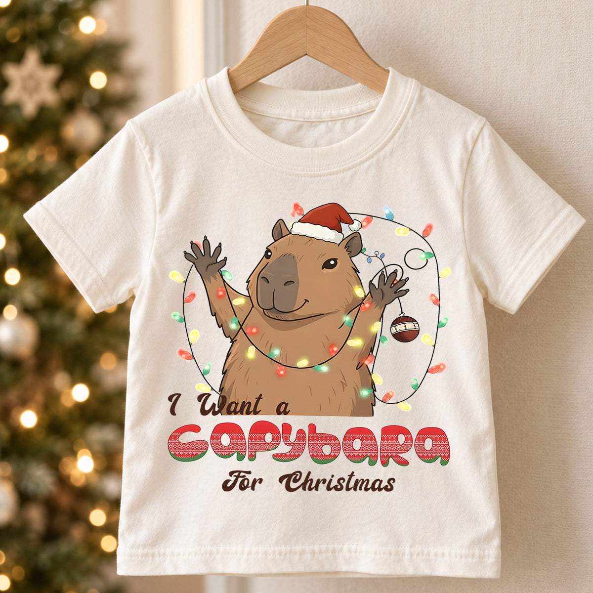 I Want a Capybara for Christmas Kids Shirt, Funny Capybara Holiday Tee, Cute Animal Christmas Shirt, Adorable Festive Gift for Kids — product view 5
