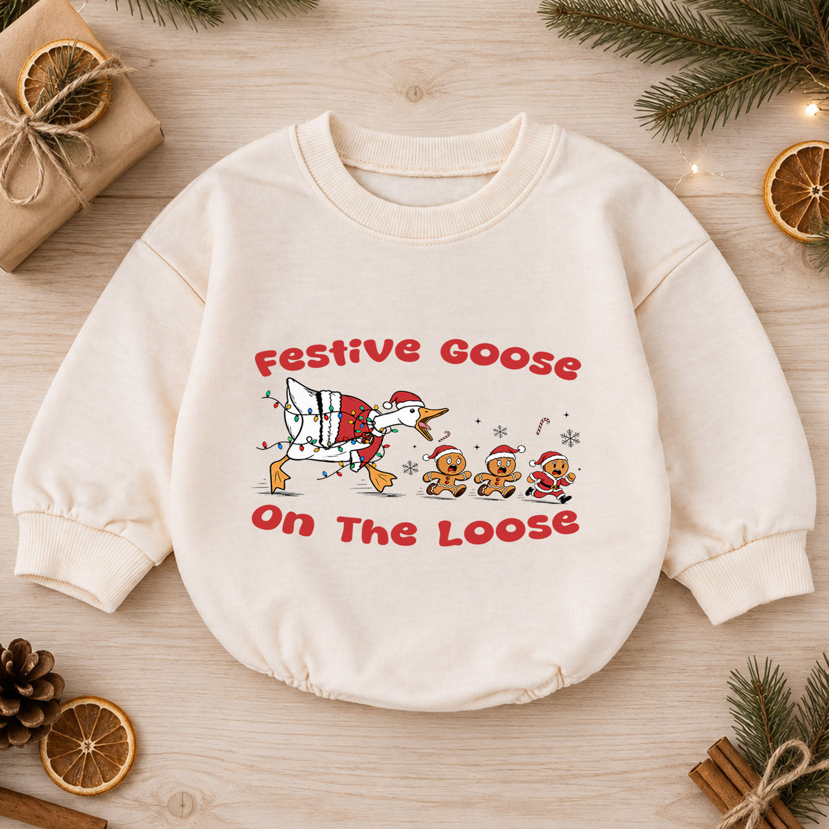 Festive Goose on the Loose Baby Romper, Funny Christmas Goose Outfit, Gingerbread Holiday Romper, Cute Xmas Baby Gift — product view 1