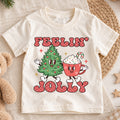 Feelin Jolly Christmas Kids Shirt, Cute Christmas Tree Hot Cocoa Tee, Retro Holiday T Shirt, Festive Xmas Outfit for Kids — product view 1