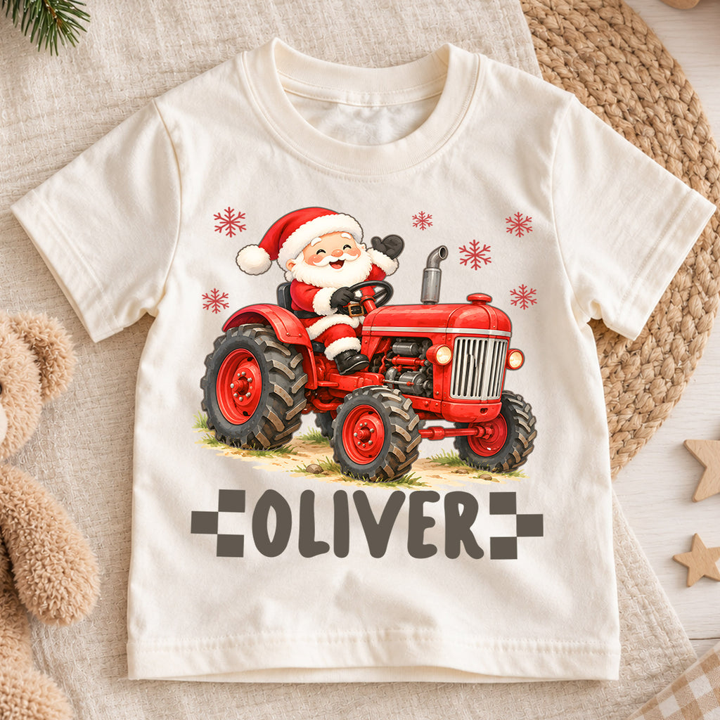 Custom Santa Tractor Christmas Kids T-Shirt, Personalized Name Farm Holiday Shirt, 1st Christmas Gift, 1st Birthday Keepsake for Boys — product view 1