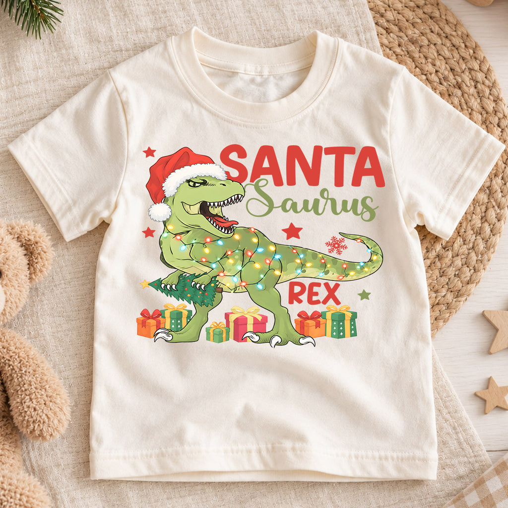 Santasaurus Rex Kids Christmas Shirt, T Rex Santa Dinosaur Tee, Funny Holiday Dino T Shirt, Christmas Gift for Kids — product view 1