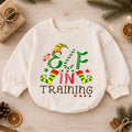Elf in Training Baby Romper, Christmas Elf Toddler 1st Birthday Holiday Outfit, Santa Helper Xmas Romper, Cute Christmas Gift for Baby — product view 1