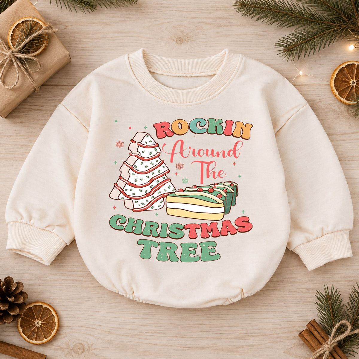 Rockin Around the Christmas Tree Snack Baby Romper, Christmas Tree Cake Holiday Outfit, Funny Food Xmas Romper Gift for Baby — product view 1