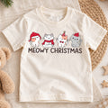 Meowy Christmas Kids Shirt, Cute Christmas Cat Tee, Santa Hat Kitty Holiday Outfit for Boys Girls, Funny Cat Lover Christmas Gift for Kids — product view 1