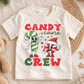 Candy Cane Crew Christmas Shirt, Groovy Holiday Kids Tee, Retro Xmas Party Outfit, Cute Winter Candy Top, Gift For Children Kids Tee — product view 1