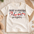 Christmas Kids Shirt, Festive Penguin Holiday Tee, Cute Winter Penguin Outfit, Christmas Party Shirt for Boys Girls, Cozy Seasonal Gift — product view 1